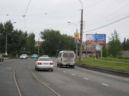 Фотография рекламного носителя, тип: Билборд 3x6, адрес: Индустриальная ул., завод ЖБИ, Нижний Тагил, Свердловская область, Россия. Сторона A №483773