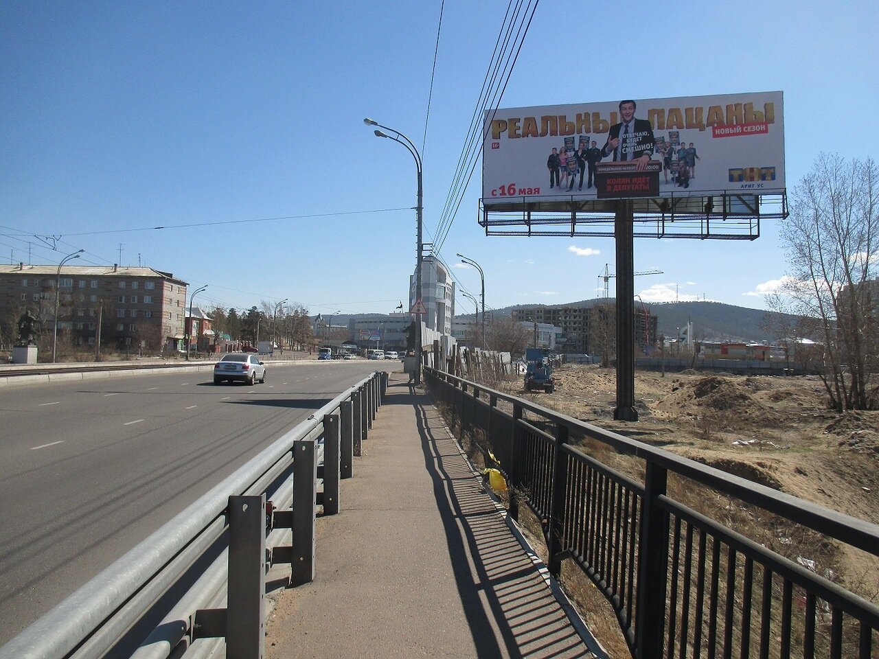 Фотография рекламного носителя, тип: Суперсайт 4x12, адрес: Строителей пр-т., съезд с Богатырского моста, Улан-Удэ, Республика Бурятия, Россия. Сторона А №697373