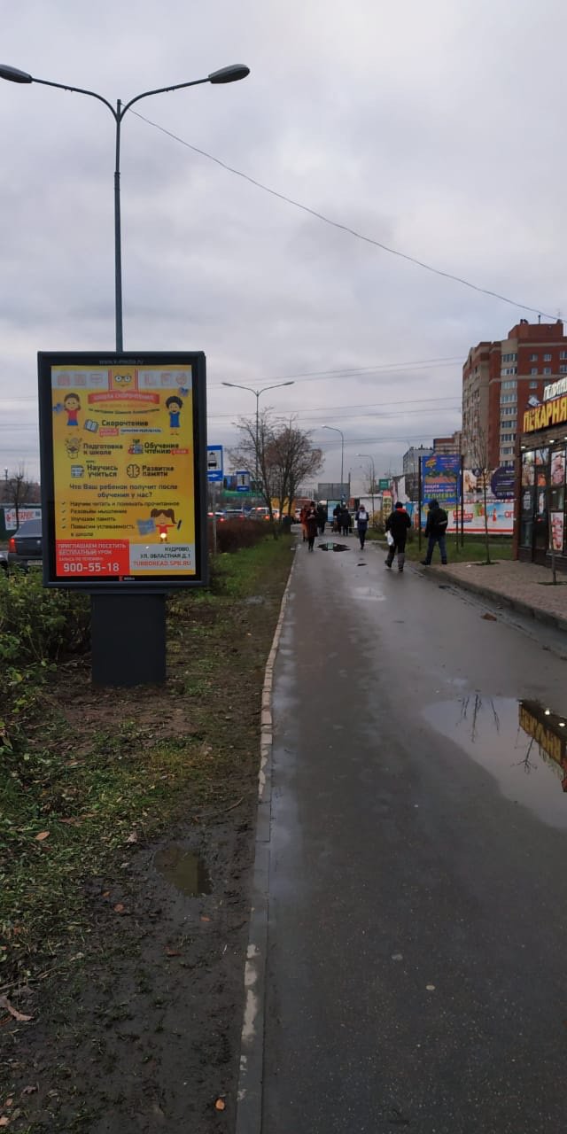 Фотография рекламного носителя, тип: Ситиформат 1.8x1.2, адрес: Ленинградская ул., за ж/д переездом, поз.3, Кудрово, Ленинградская область, Россия. Сторона A №717335