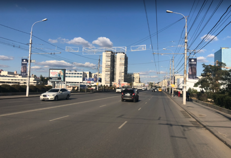 Фотография рекламного носителя, тип: Панель-кронштейн, адрес: Рабоче-Крестьянская ул, Астраханский мост, Волгоград, Волгоградская область, Россия. Сторона А №1096237