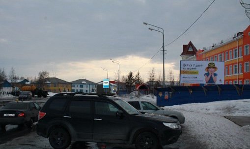 Фотография рекламного носителя, тип: Билборд 3x6, адрес: Тарко-Сале пос., Губкина ул., д.12, Салехард, Ямало-Ненецкий автономный округ, Россия. Сторона А №678042