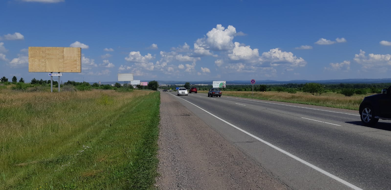 Фотография рекламного носителя, тип: Билборд 3x6, адрес: а/д Р-257, 430 000 м, р-н кольцевой развязки, Абакан, Республика Хакасия, Россия. Сторона Б №1094691