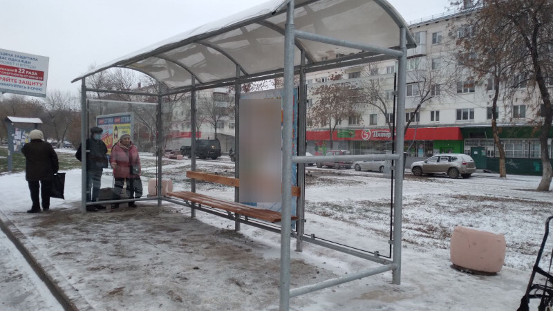 Фотография рекламного носителя, тип: Остановка 1.8x1.2, адрес: Победы пр-т., д. 7, Новокуйбышевск, Самарская область, Россия. Сторона В1 №1081487