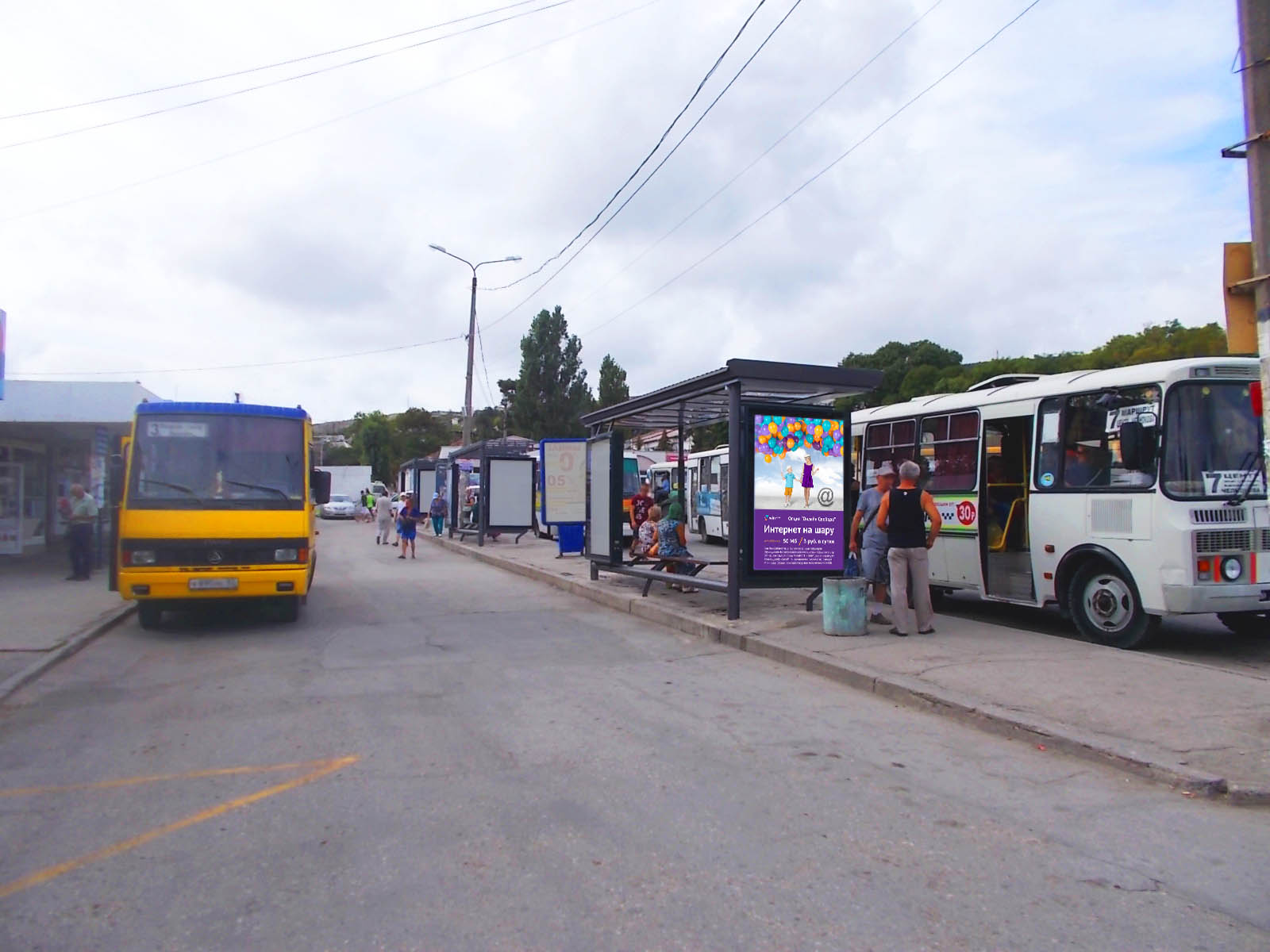 Фотография рекламного носителя, тип: Остановка 1.8x1.2, адрес: Советская ул. Х Назукина ул., ост. Центральная, поз.1, Феодосия, Республика Крым, Россия. Сторона B1 №843684