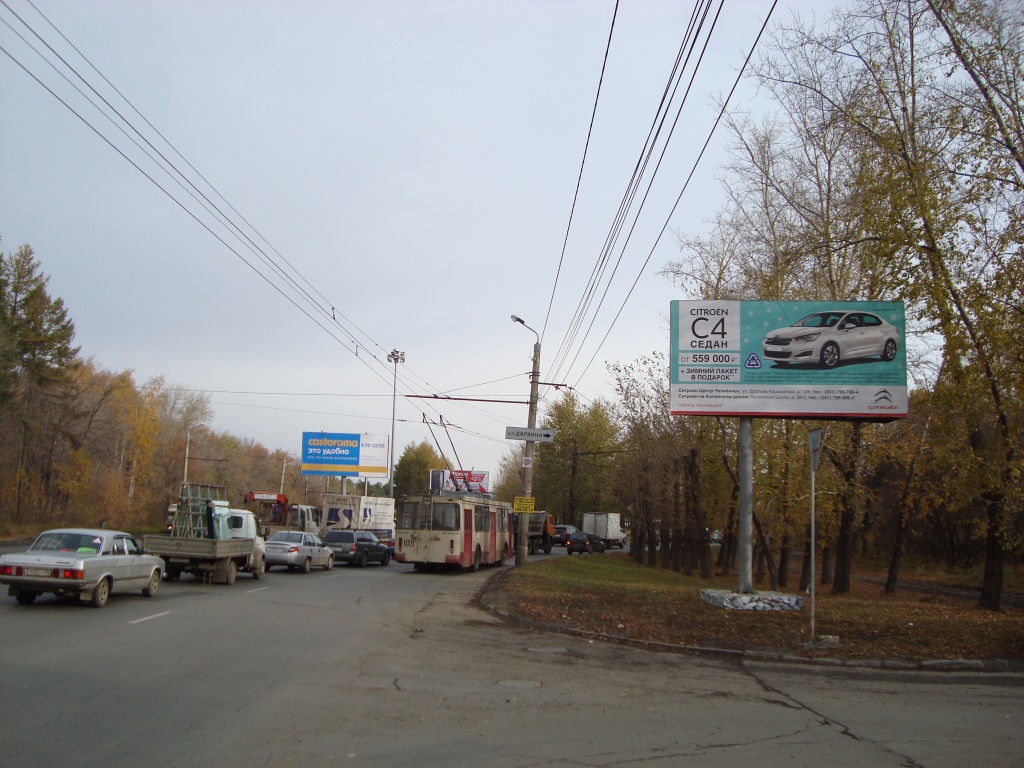 Фотография рекламного носителя, тип: Билборд 3x6, адрес: Блюхера ул., развязка дорог на Мебельной фабрике, Челябинск, Челябинская область, Россия. Сторона А №184810