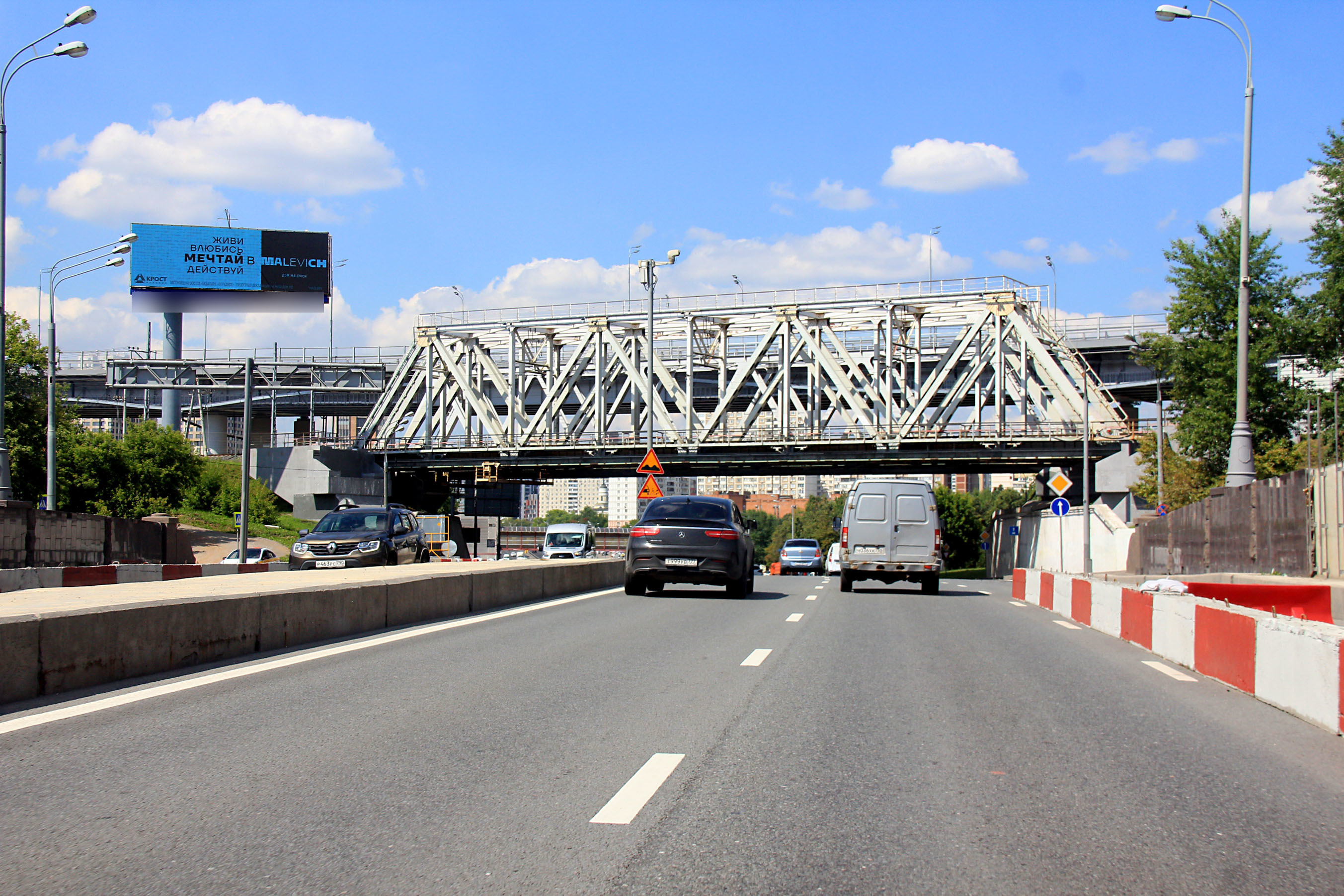 Фотография рекламного носителя, тип: Суперсайт 5x15, адрес: Дмитровское ш., д.65г, Москва, Россия. Сторона Б1 №638858