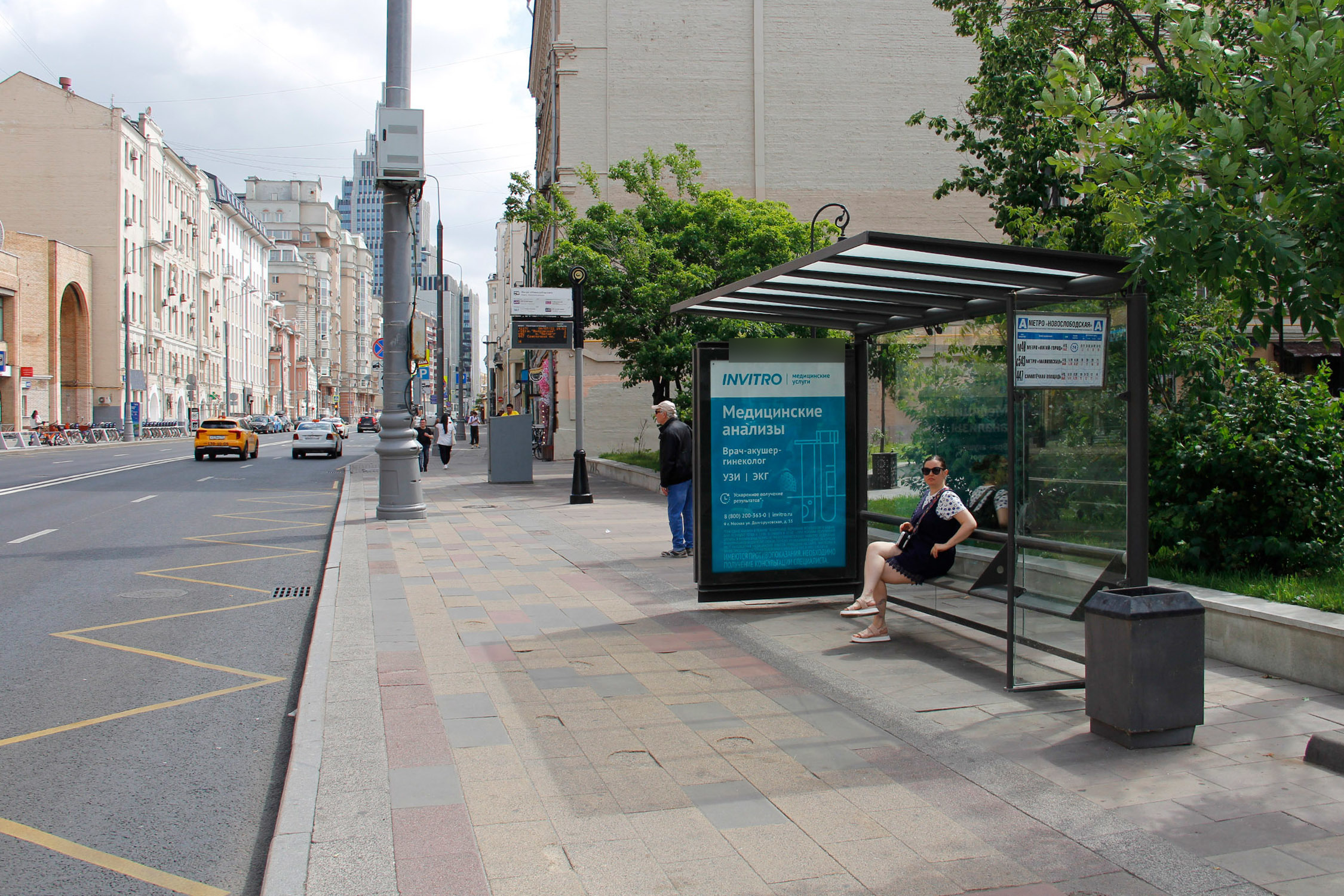 Фотография рекламного носителя, тип: Остановка 1.8x1.2, адрес: Новослободская ул., ост. м. Новослободская, Москва, Россия. Сторона А №334930