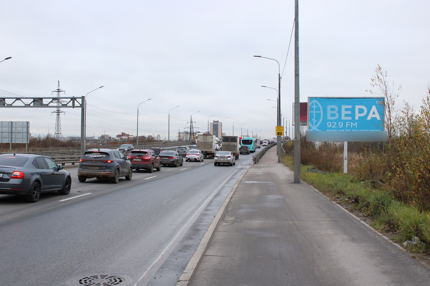Фотография рекламного носителя, тип: Билборд 3x6, адрес: Мурманское ш., пост ГИБДД, Санкт-Петербург, Россия. Сторона А №106497
