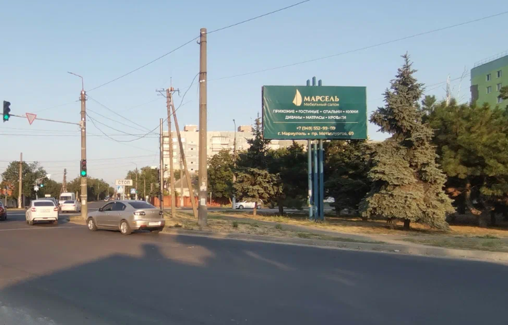 Фотография рекламного носителя, тип: Билборд 3x6, адрес: Олимпийская ул., д.72 Х 130-й Таганрогской Дивизии ул., Мариуполь, Донецкая область, Россия. Сторона А №1327260