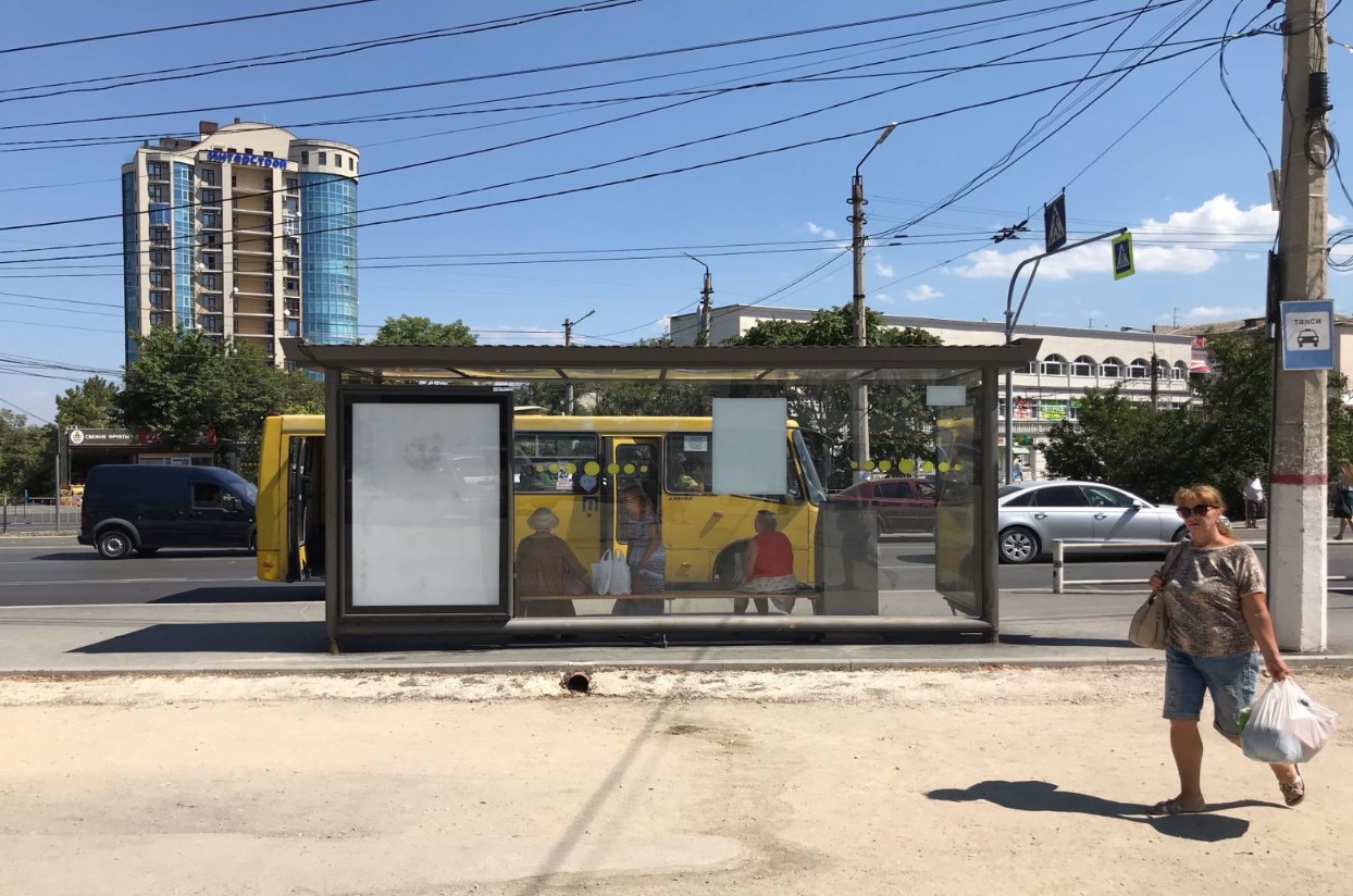 Фотография рекламного носителя, тип: Остановка 1.8x1.2, адрес: Гагарина пр-т., ост. Кинотеатр Россия, поз.2, Севастополь, Россия. Сторона Б №721488