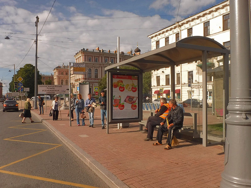 Фотография рекламного носителя, тип: Остановка 1.8x1.2, адрес: Труда пл. Х Якубовича ул., поз.1, Санкт-Петербург, Россия. Сторона А №164157
