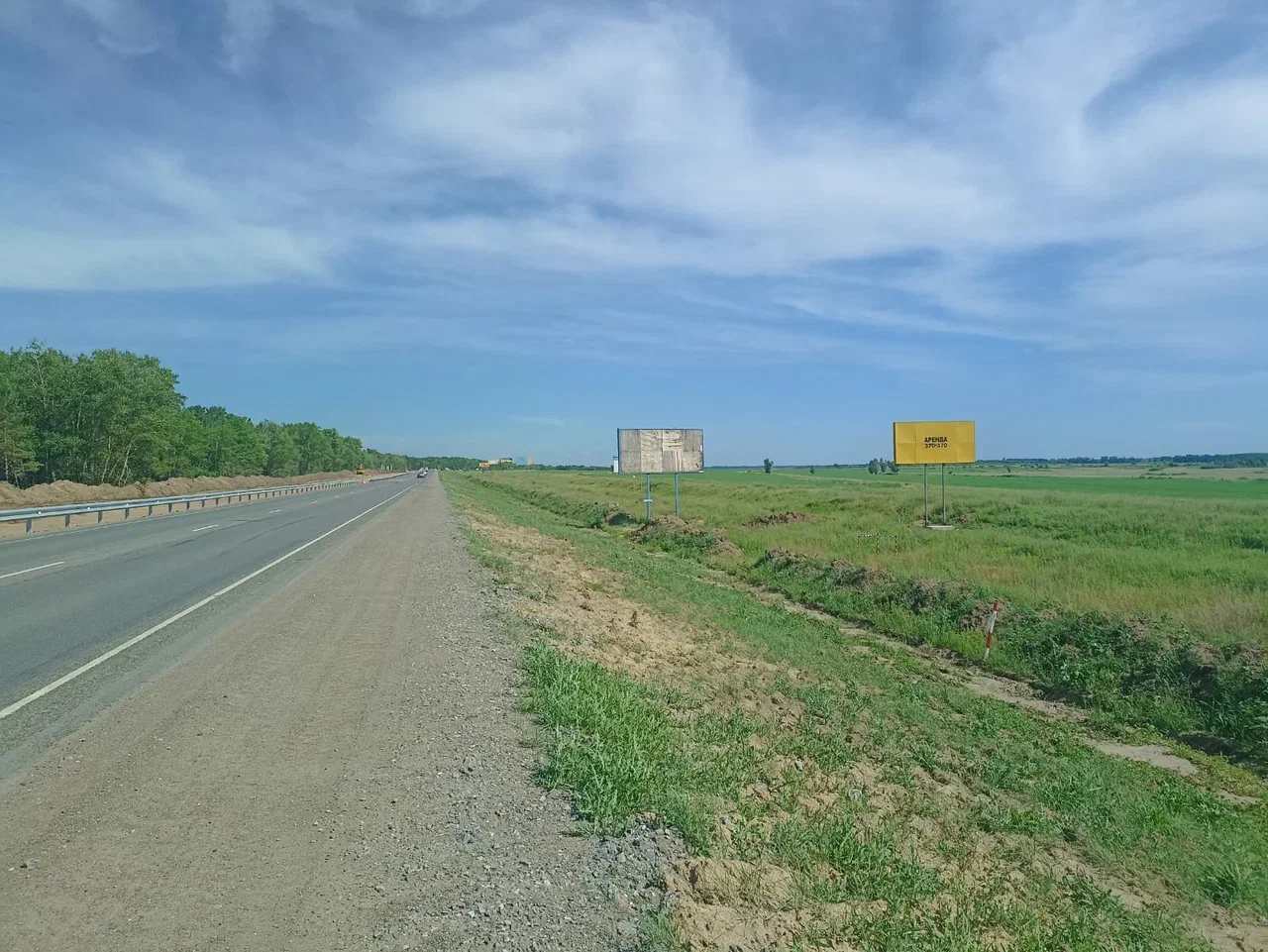 Фотография рекламного носителя, тип: Билборд 3x6, адрес: Омск-Черлак а/д., 18 141 м., Омск, Омская область, Россия. Сторона А №1361471
