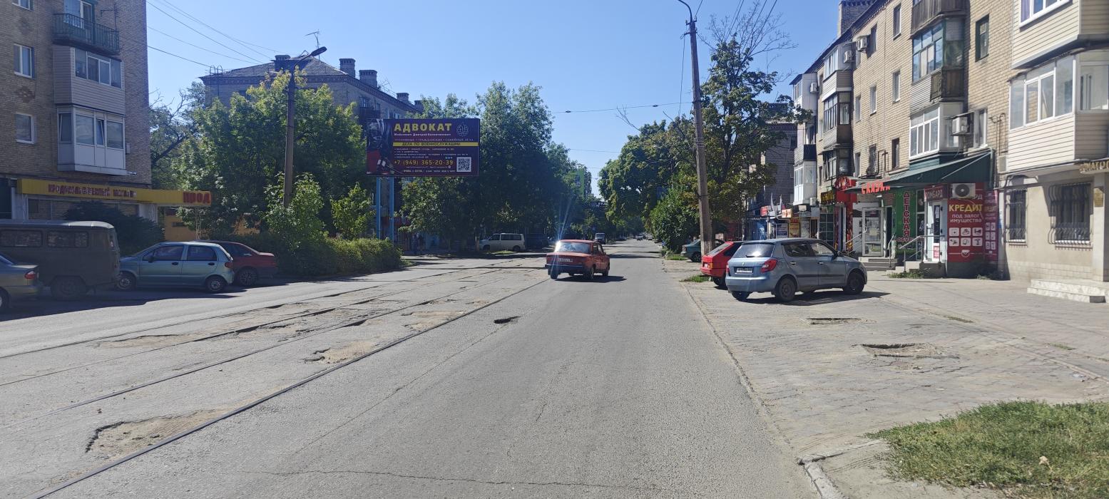 Фотография рекламного носителя, тип: Билборд 3x6, адрес: Гагарина ул., д.42, Горловка, Донецкая область, Россия. Сторона В №1326918