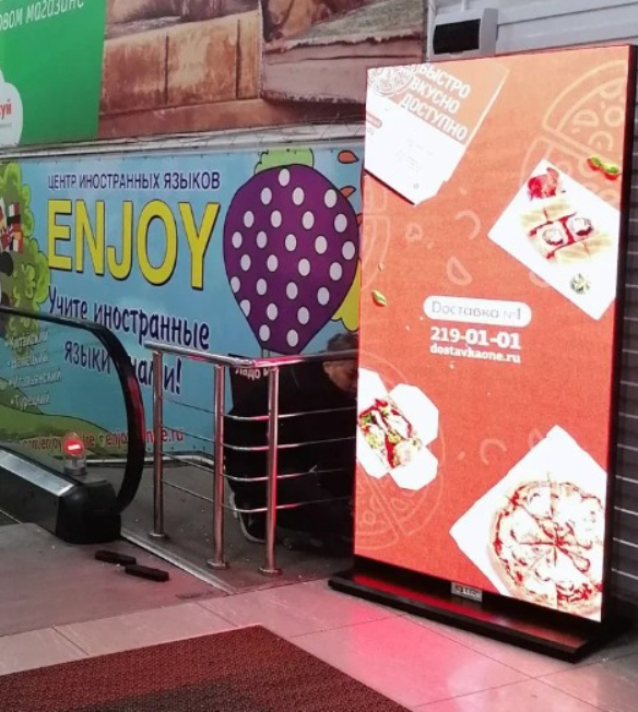 Фотография рекламного носителя, тип: Видеоэкран, адрес: Торговый центр «Славянский», Новосибирская ул., д.7, Красноярск, Красноярский край, Россия. Сторона/вариант №1350072