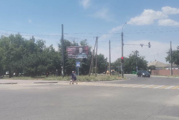 Фотография рекламного носителя, тип: Билборд 3x6, адрес: Олимпийская ул., д.72 Х 130-й Таганрогской Дивизии ул., Мариуполь, Донецкая область, Россия. Сторона Б №1336695