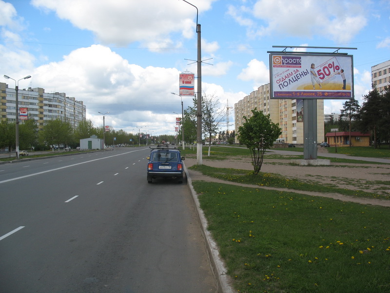 Фотография рекламного носителя, тип: Билборд 3x6, адрес: Воровского ул. Х Крикковское ш., Кингисепп, Ленинградская область, Россия. Сторона А №131807