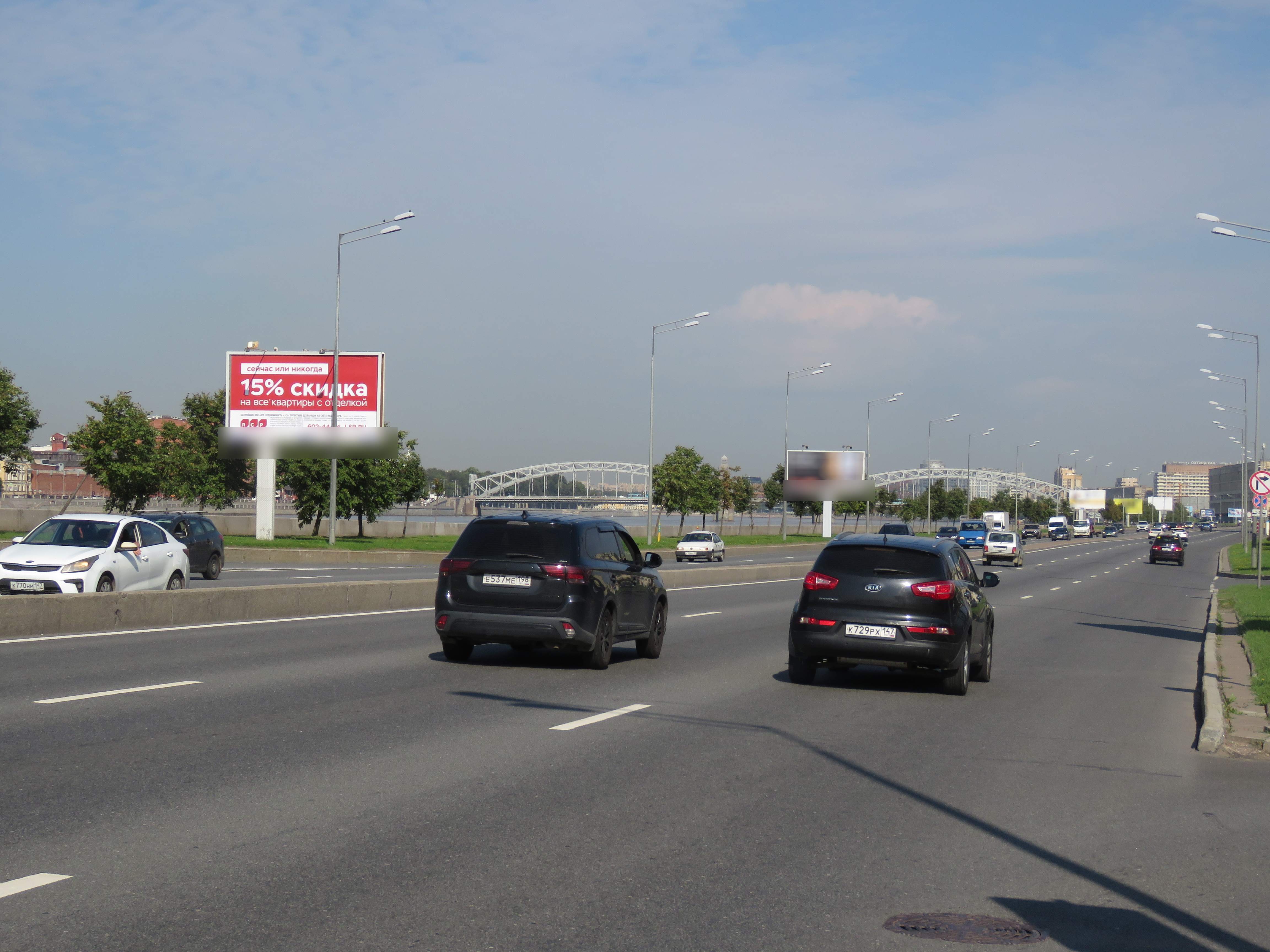 Фотография рекламного носителя, тип: Билборд 3x6, адрес: Малоохтинская наб. Х Малоохтинский пр-т., д.59, Санкт-Петербург, Россия. Сторона Б №768026