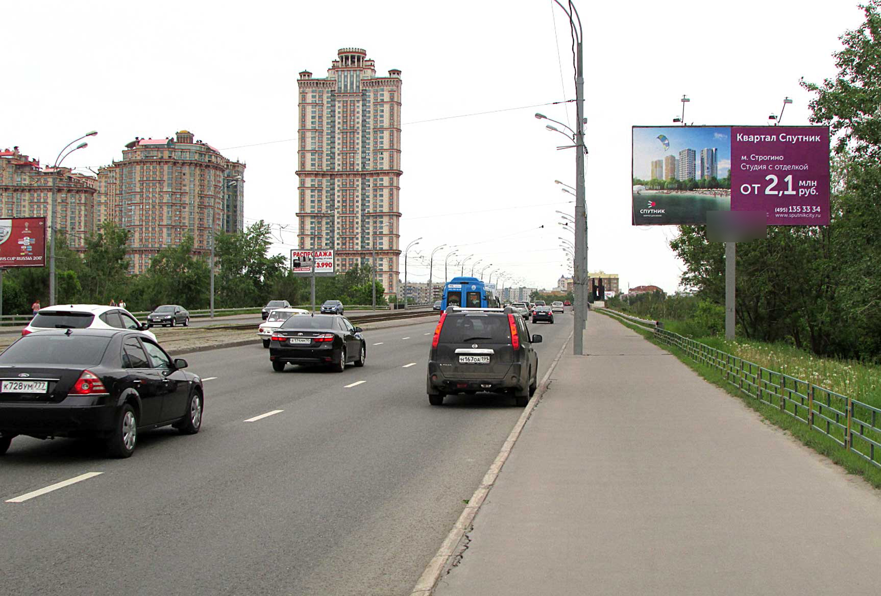 Фотография рекламного носителя, тип: Билборд 3x6, адрес: Строгинское ш., при въезде на Строгинский мост, Москва, Россия. Сторона A №15403