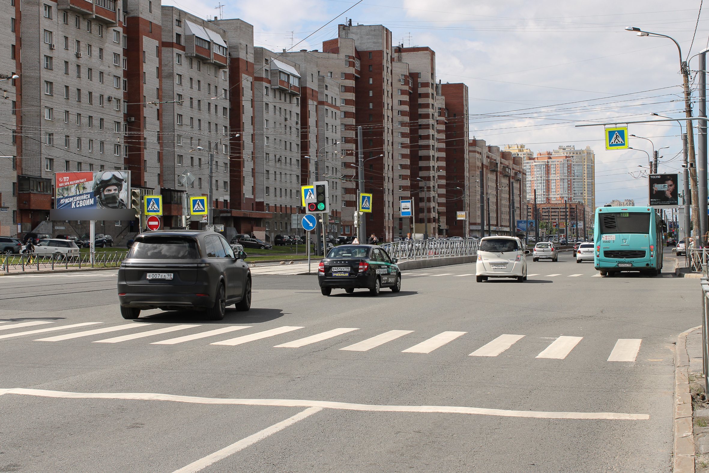 Фотография рекламного носителя, тип: Билборд 3x6, адрес: Просвещения пр-т., д.53, корп.1 Х Демьяна Бедного ул., Санкт-Петербург, Россия. Сторона Б1 №719409