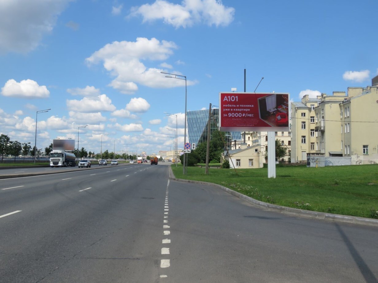 Фотография рекламного носителя, тип: Билборд 3x6, адрес: Малоохтинский наб., выезд с АЗС, Санкт-Петербург, Россия. Сторона А1 №106193