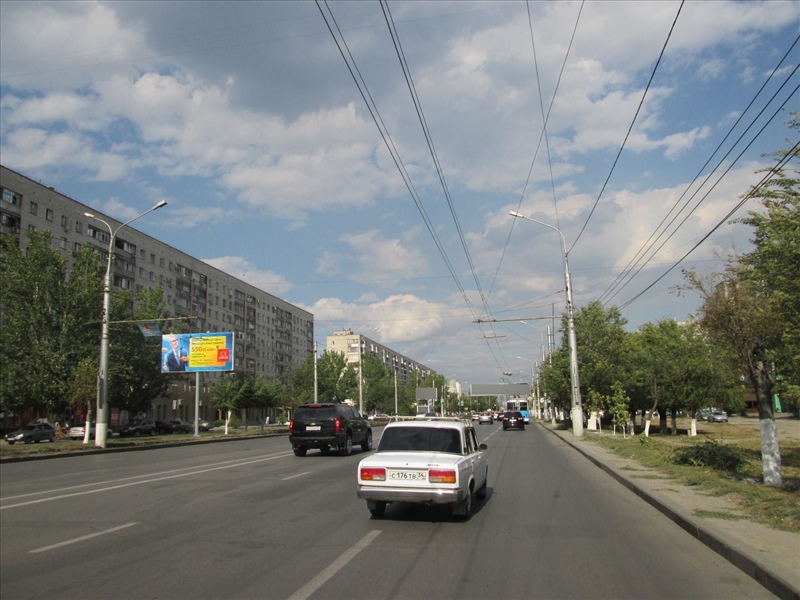 Фотография рекламного носителя, тип: Билборд 3x6, адрес: Николая Отрады ул., д.11А Х Менжинского ул., Волгоград, Волгоградская область, Россия. Сторона Б №111508