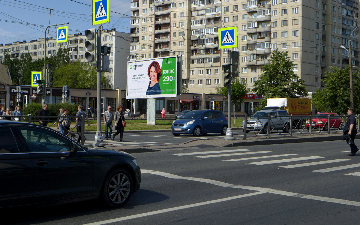 Фотография рекламного носителя, тип: Билборд 3x6, адрес: Большевиков пр-т., д.7, корп.1, Санкт-Петербург, Россия. Сторона B №172206