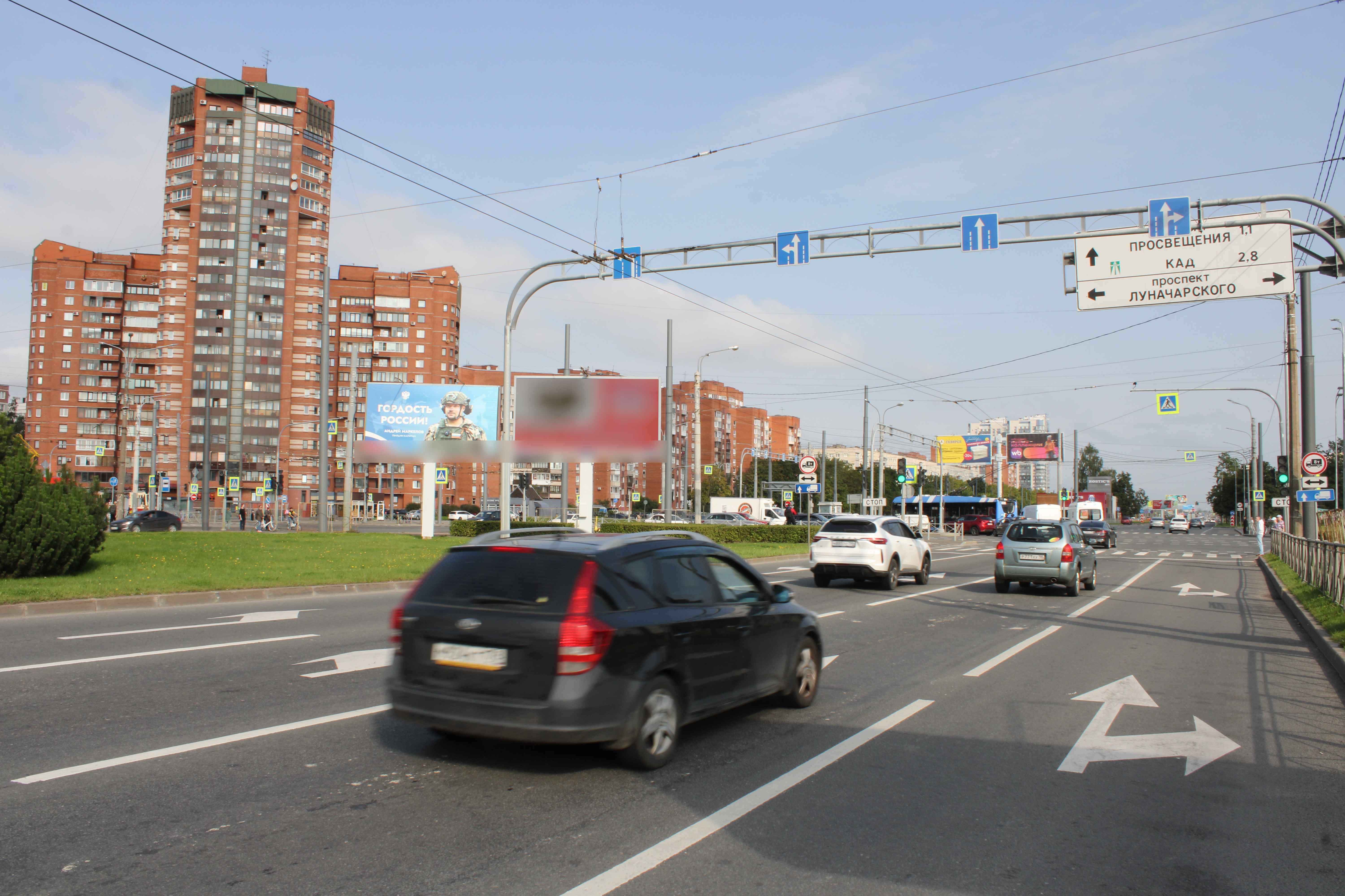 Фотография рекламного носителя, тип: Билборд 3x6, адрес: Культуры пр-т., д.3а Х Луначарского пр-т., поз.2, Санкт-Петербург, Россия. Сторона А №708161