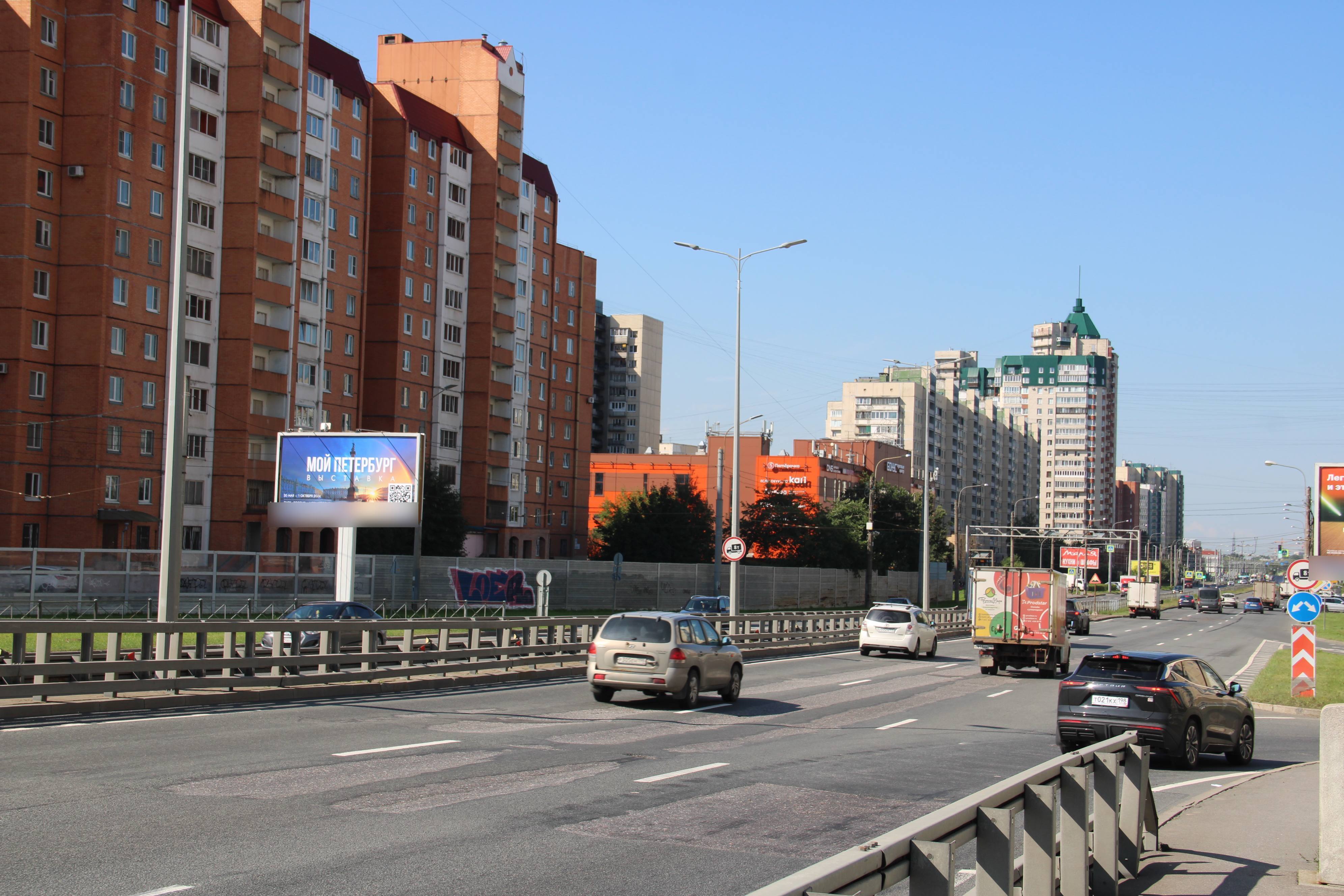 Фотография рекламного носителя, тип: Билборд 3x6, адрес: Косыгина пр-т. Х Комуны ул., Санкт-Петербург, Россия. Сторона Б №106724