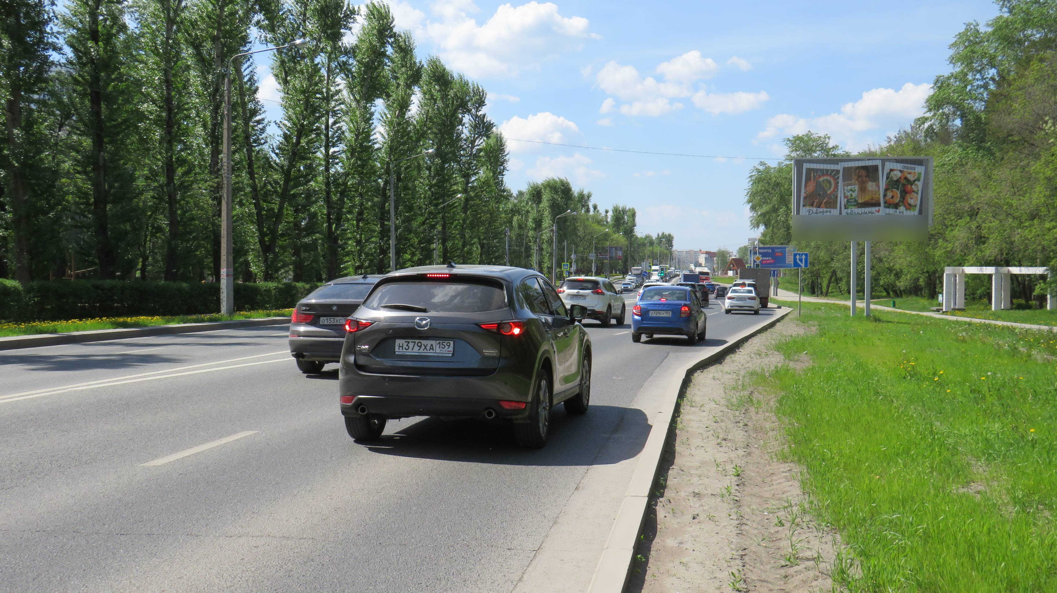 Фотография рекламного носителя, тип: Билборд 3x6, адрес: Космонавтов ш., д.187, Пермь, Пермский край, Россия. Сторона А1-А3 №1053371