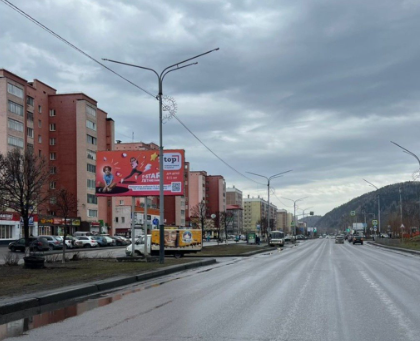 Фотография рекламного носителя, тип: Билборд 3x6, адрес: Шахтеров пр-т., д.19, Междуреченск, Кемеровская область, Россия. Сторона Б №1348790