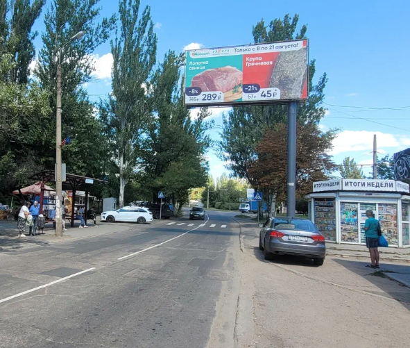 Фотография рекламного носителя, тип: Билборд 3x6, адрес: Раздольная ул., д.12а, Донецк, Донецкая область, Россия. Сторона А №1327630