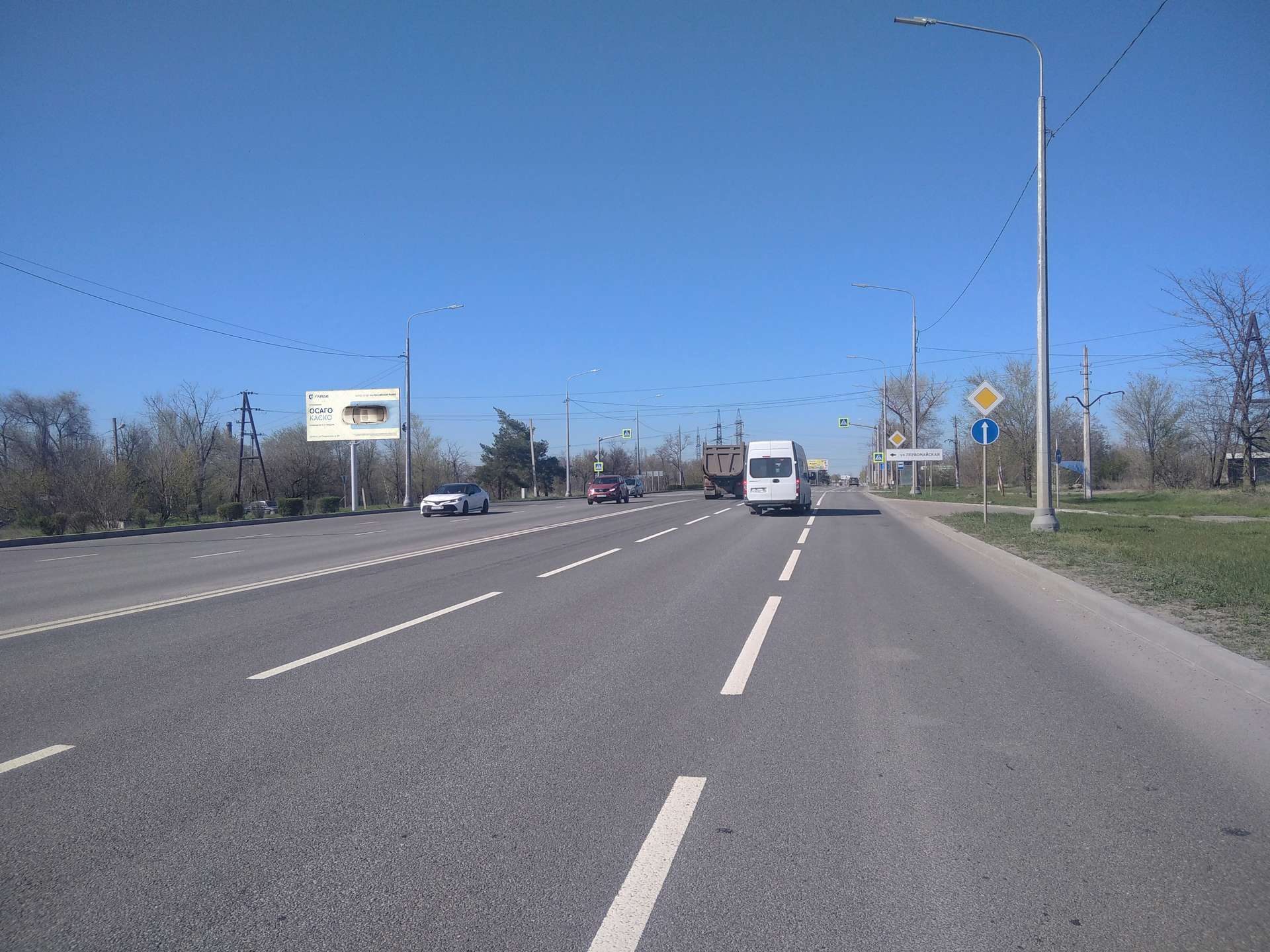 Фотография рекламного носителя, тип: Билборд 3x6, адрес: пр. Карпова, перед поворотом на ул. Первомайскую, Мариуполь, Донецкая область, Россия. Сторона Б №1372515