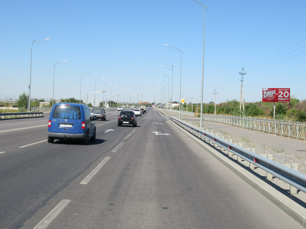 Фотография рекламного носителя, тип: Билборд 3x6, адрес: Авиаторов ш., напротив д.74, Волгоград, Волгоградская область, Россия. Сторона А №111267