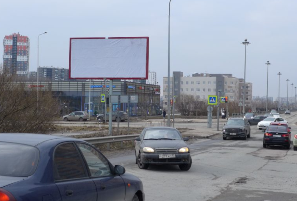 Фотография рекламного носителя, тип: Билборд 3x6, адрес: Ленинградская ул. Х Строителей пр-т., Кудрово, Ленинградская область, Россия. Сторона B №717272