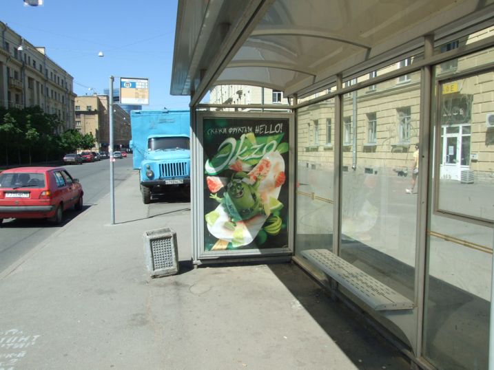 Фотография рекламного носителя, тип: Остановка 1.8x1.2, адрес: Стахановцев ул., д.10В, Санкт-Петербург, Россия. Сторона А №130080