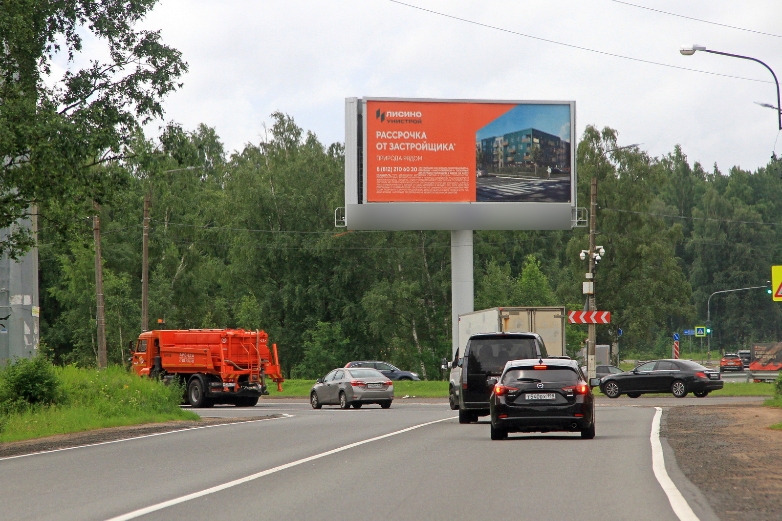 Фотография рекламного носителя, тип: Суперсайт 5x12, адрес: Приморское ш. X Зеленогорское ш., Санкт-Петербург, Россия. Сторона А1 №1088589