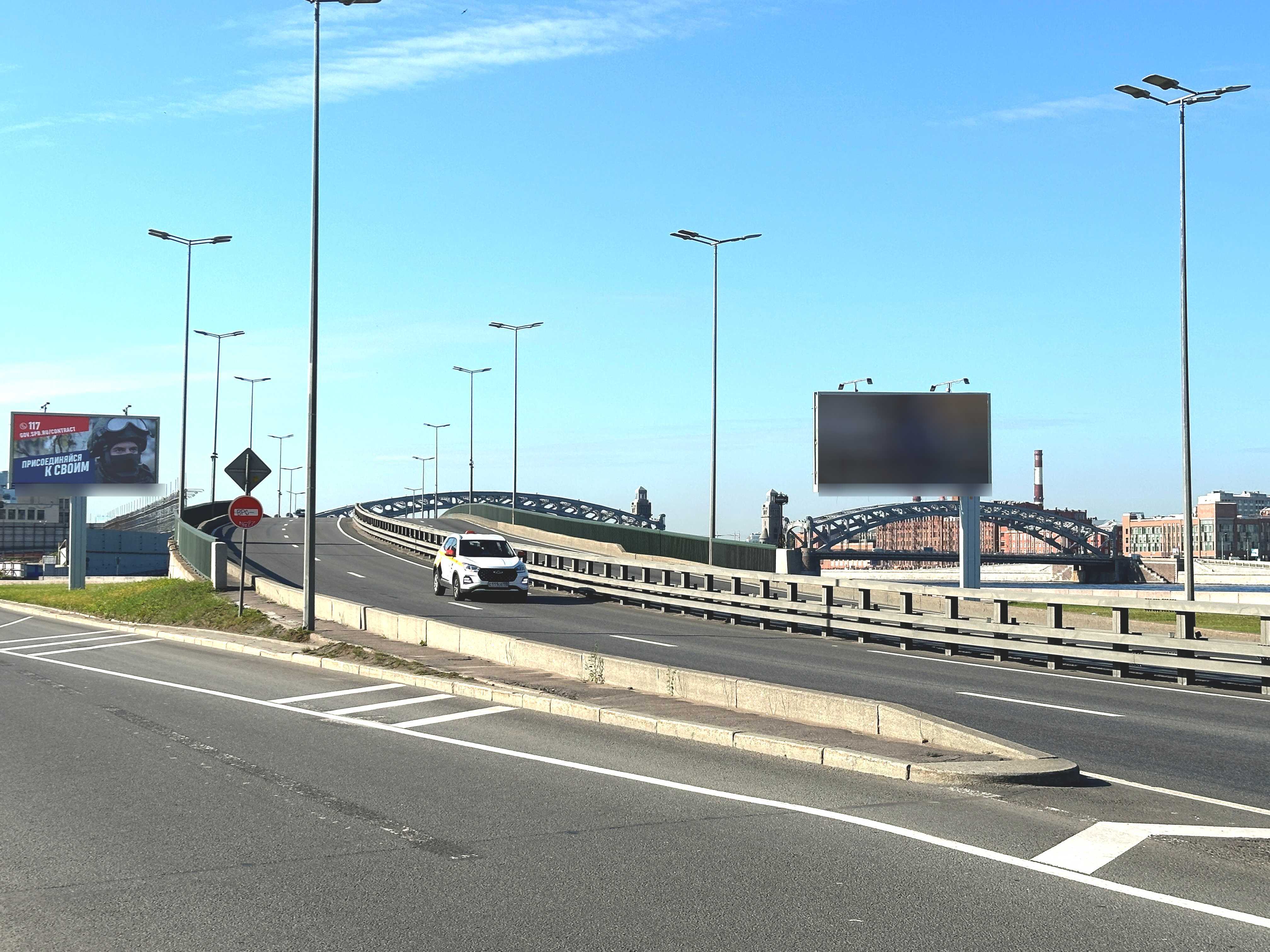 Фотография рекламного носителя, тип: Билборд 3x6, адрес: Свердловская наб., мост через р. Охта, поз.2, Санкт-Петербург, Россия. Сторона Б №105681
