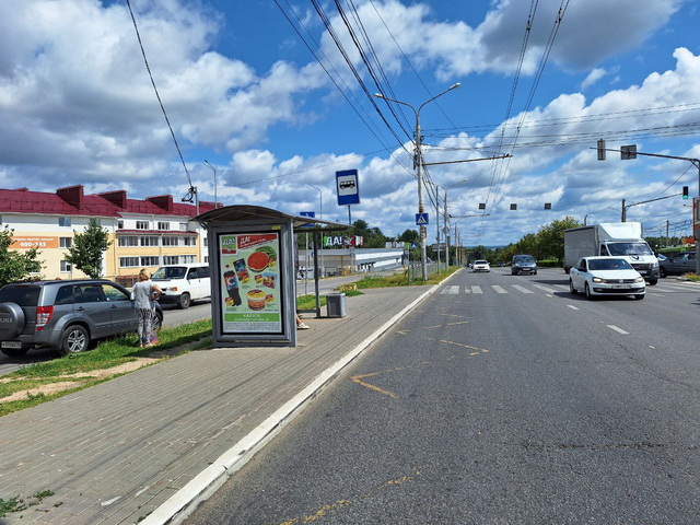 Фотография рекламного носителя, тип: Остановка 1.8x1.2, адрес: Генерала Попова ул., д.2, Калуга, Калужская область, Россия. Сторона В1-B5 №621596