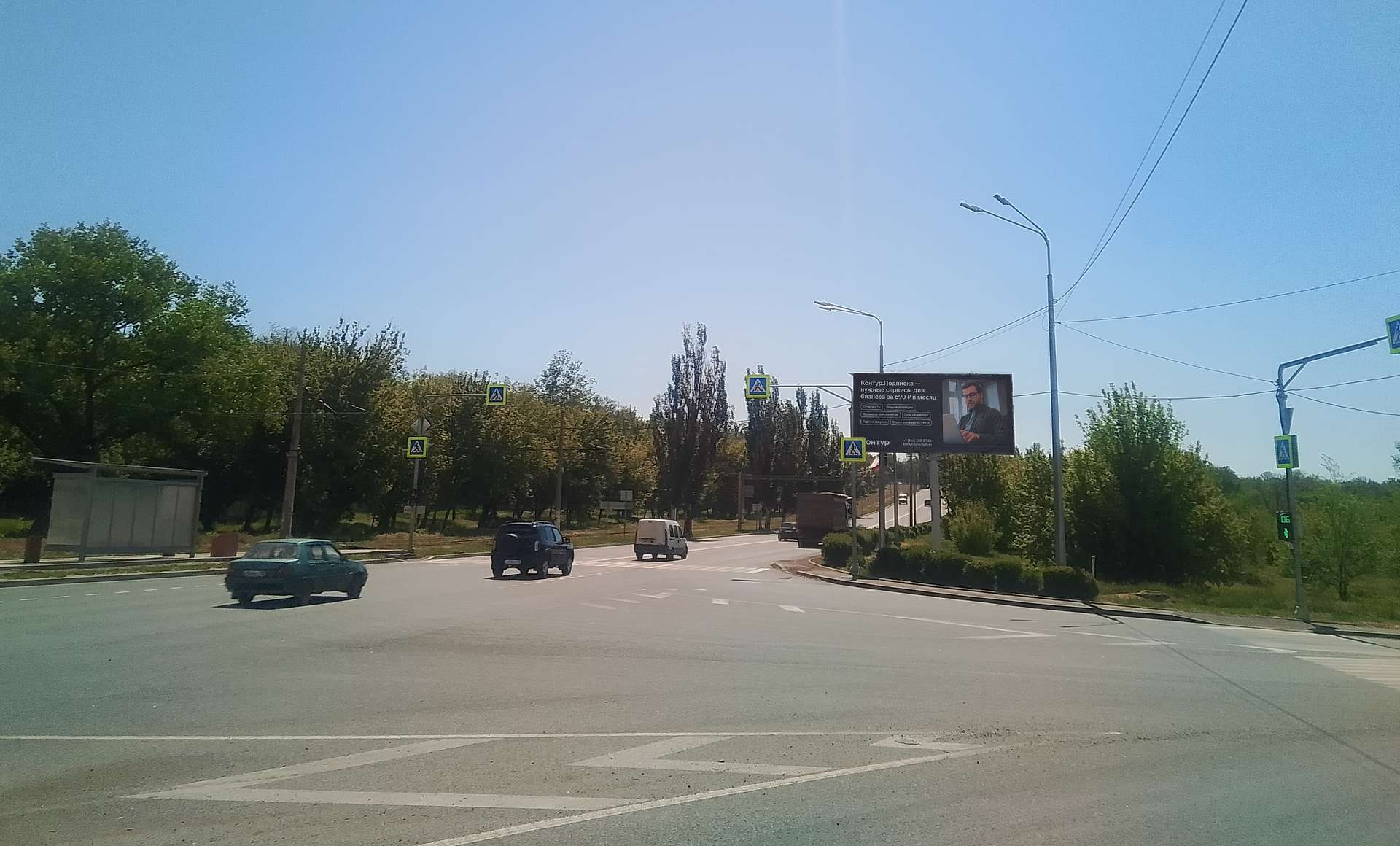 Фотография рекламного носителя, тип: Билборд 3x6, адрес: пр. Карпова на пересечении с ул. Тополиной, Мариуполь, Донецкая область, Россия. Сторона А №1372512