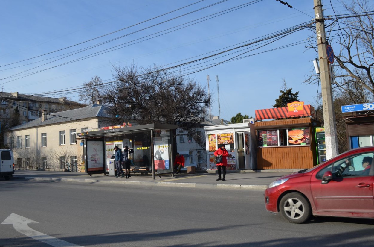 Фотография рекламного носителя, тип: Остановка 1.8x1.2, адрес: Гагарина пр-т., ост. Кинотеатр Россия, поз.1, Севастополь, Россия. Сторона A1-А5 №721481