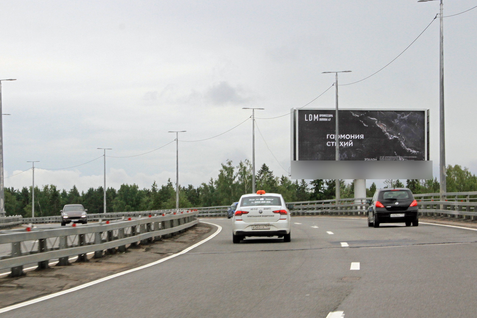 Фотография рекламного носителя, тип: Суперсайт 5x12, адрес: Лисий нос пос., Приморское ш., съезд с виадука, Санкт-Петербург, Россия. Сторона А №1088591