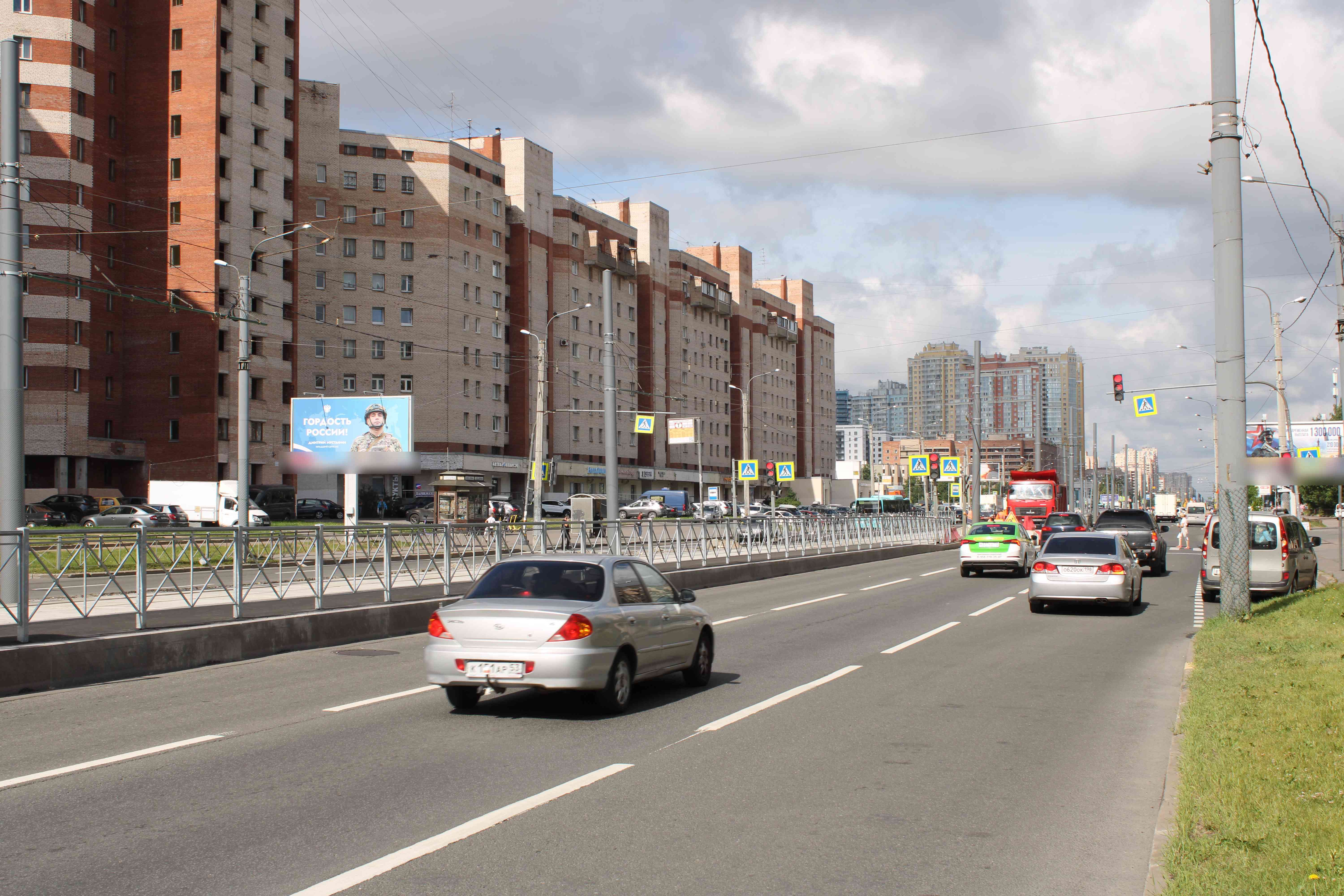 Фотография рекламного носителя, тип: Билборд 3x6, адрес: Просвещенияпр-т., д.70, корп.1, Санкт-Петербург, Россия. Сторона Б1 №639431