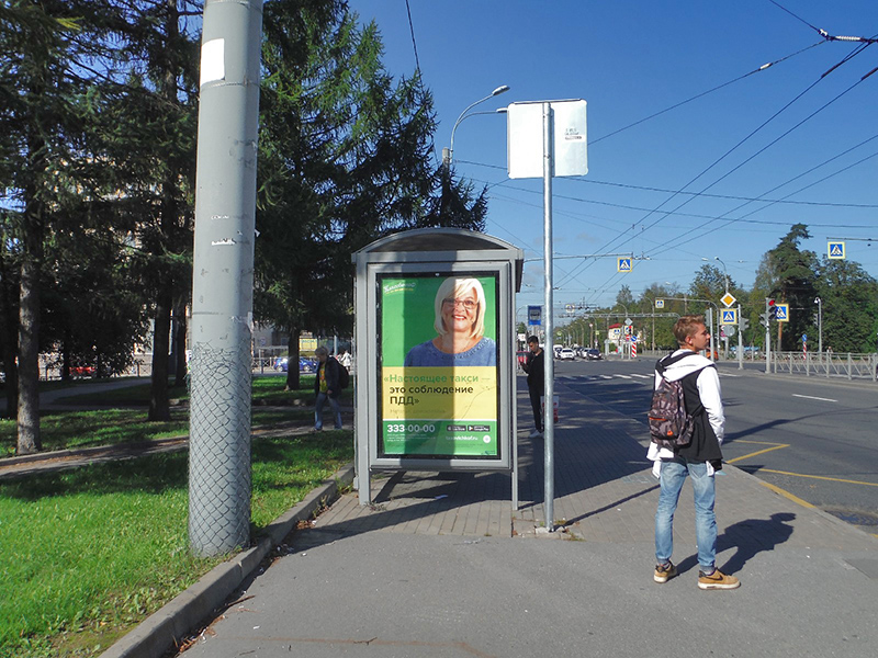 Фотография рекламного носителя, тип: Остановка 1.8x1.2, адрес: Мориса Тореза пр-т. Х Светлановский пр-т., д.39, Санкт-Петербург, Россия. Сторона В №164398