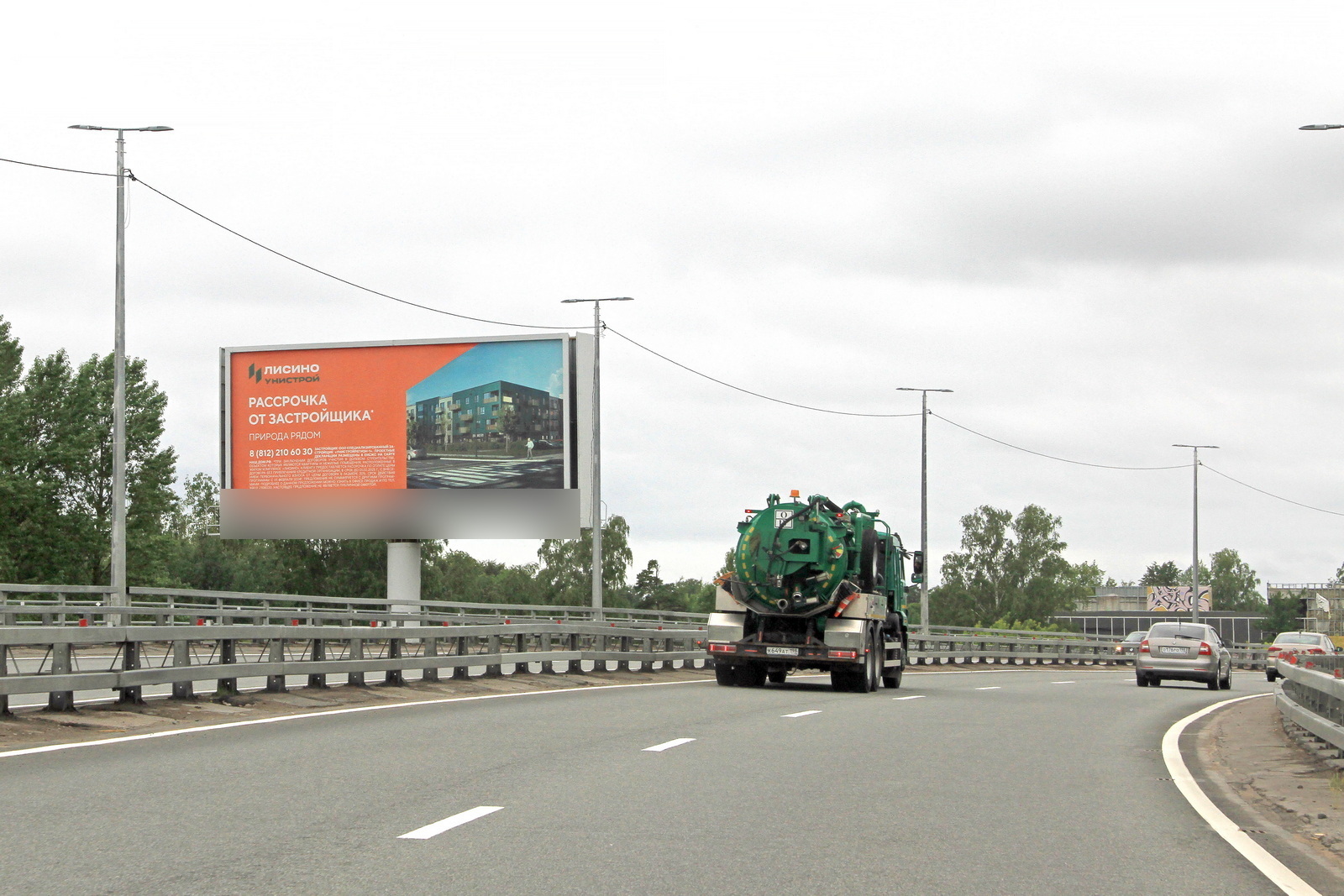 Фотография рекламного носителя, тип: Суперсайт 5x12, адрес: Лисий нос пос., Приморское ш., съезд с виадука, Санкт-Петербург, Россия. Сторона Б №1088592