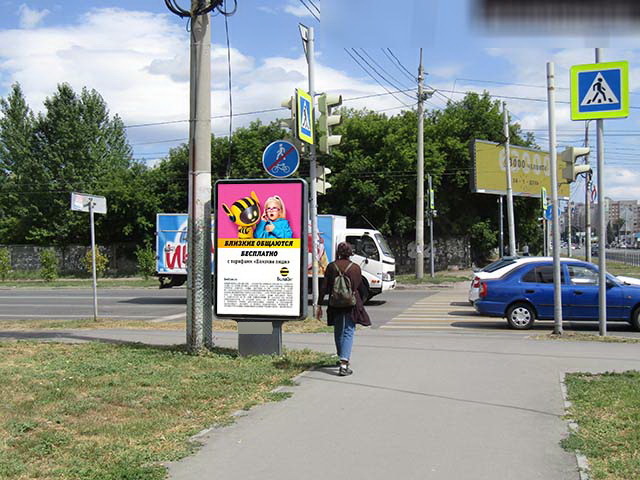 Фотография рекламного носителя, тип: Ситиформат 1.8x1.2, адрес: Масленникова ул., д.76 Х Жукова ул., Омск, Омская область, Россия. Сторона Б №197901