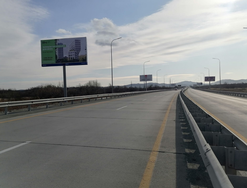 Фотография рекламного носителя, тип: Билборд 3x6, адрес: подъезд к аэропорту Кневичи а/д, 1 360м, справа, Владивосток, Приморский край, Россия. Сторона Б №974840