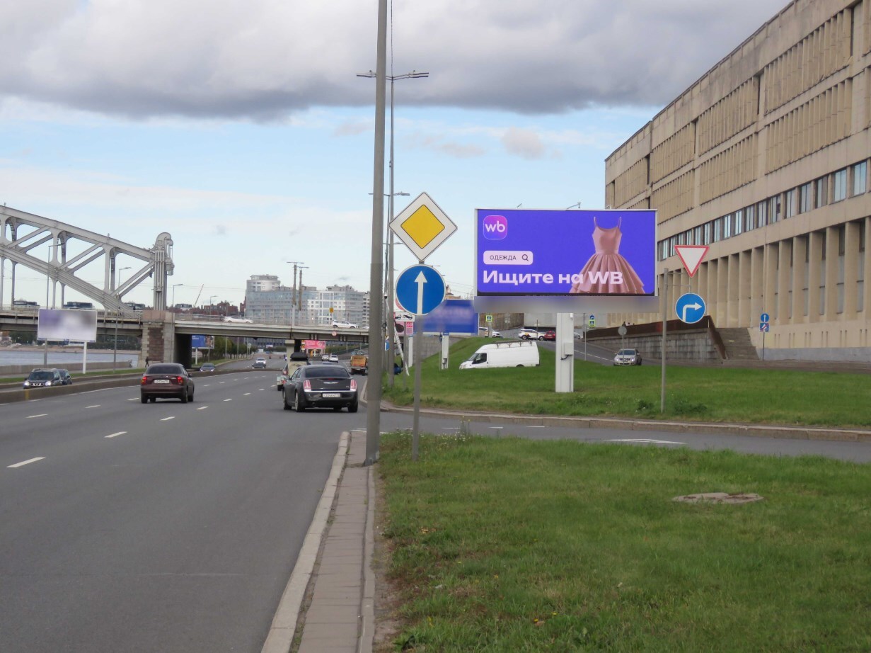 Фотография рекламного носителя, тип: Билборд 3x6, адрес: Малоохтинский наб. Х Новочеркасский пр-т., д.3Б, Санкт-Петербург, Россия. Сторона А1 №119766