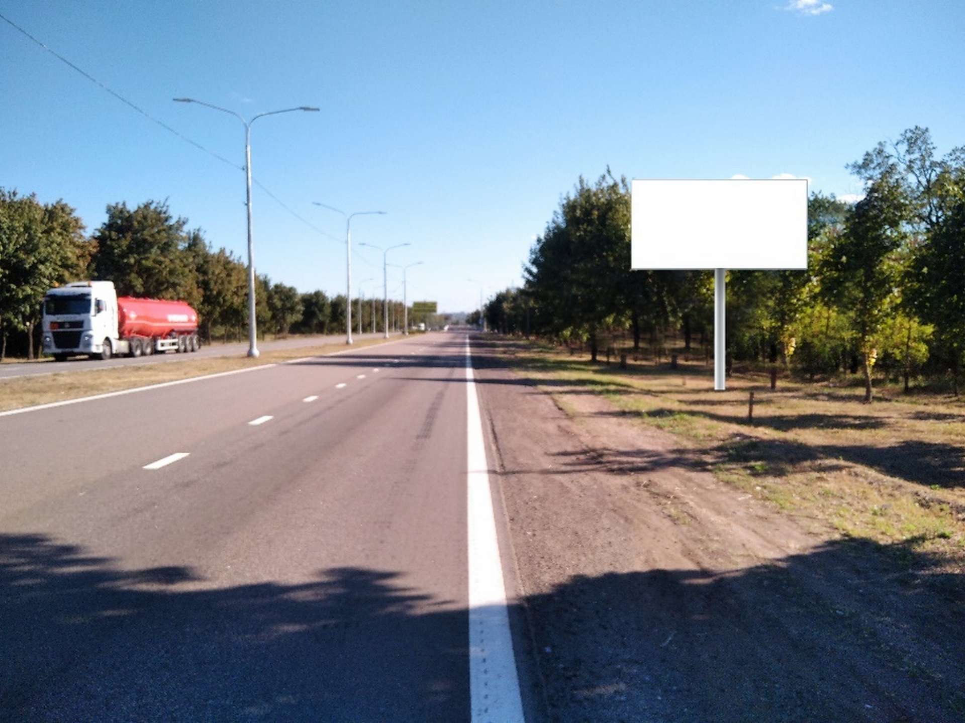 Фотография рекламного носителя, тип: Билборд 3x6, адрес: Донецкое шоссе, въезд в Мариуполь, 500м до ул. Новосибирская, Мариуполь, Донецкая область, Россия. Сторона А №1372500