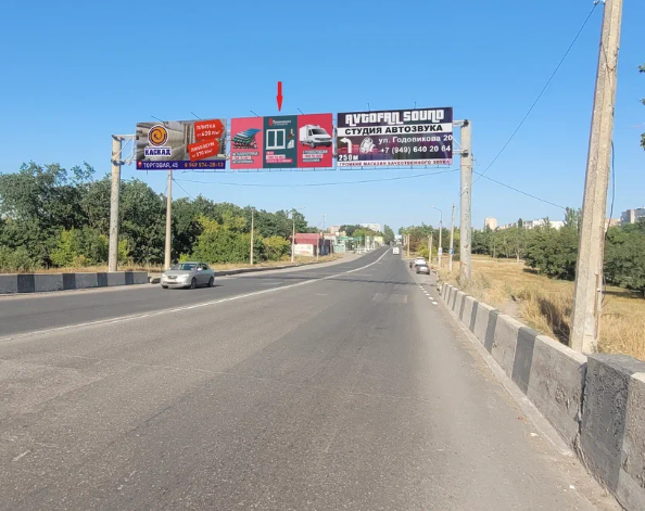 Фотография рекламного носителя, тип: Мультиборд, адрес: Петровского ул., перед мостом, Донецк, Донецкая область, Россия. Сторона В2 №1327438