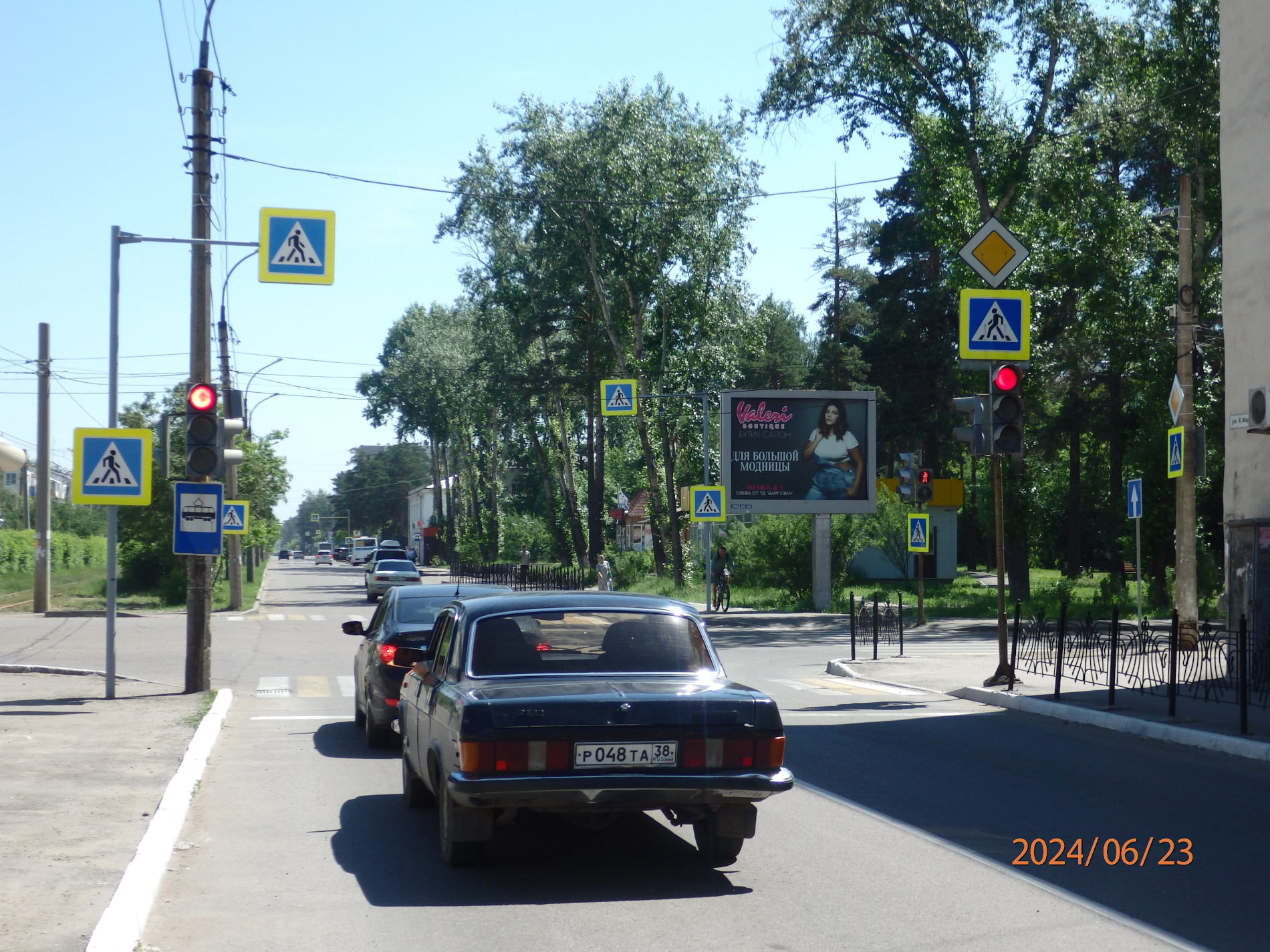 Фотография рекламного носителя, тип: Ситиборд 2.7x3.7, адрес: К.Маркса пр-т. Х Файзулина ул., Ангарск, Иркутская область, Россия. Сторона А №159857